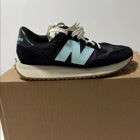 New Balance Shoes - New Balance Black Sneakers with Light Blue 'N' Accent